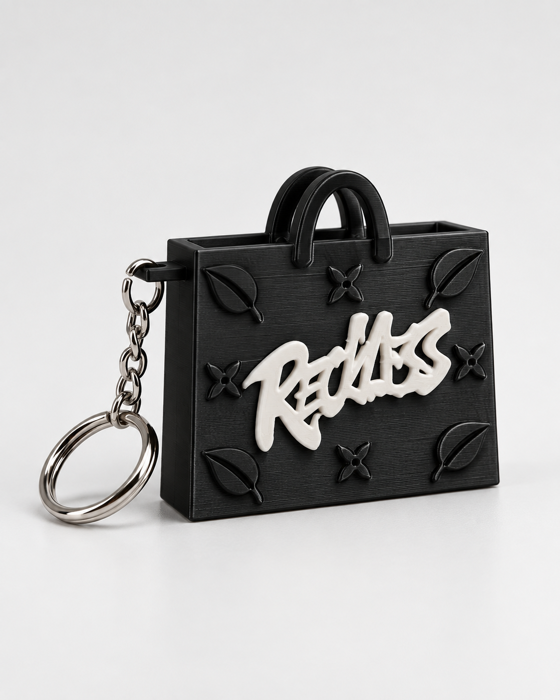 InKeynito Chain AirTag holder keychain - Black and white limited edition