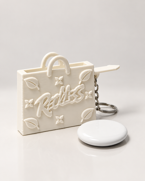 InKeynito Chain AirTag holder keychain - White, front view with AirTag